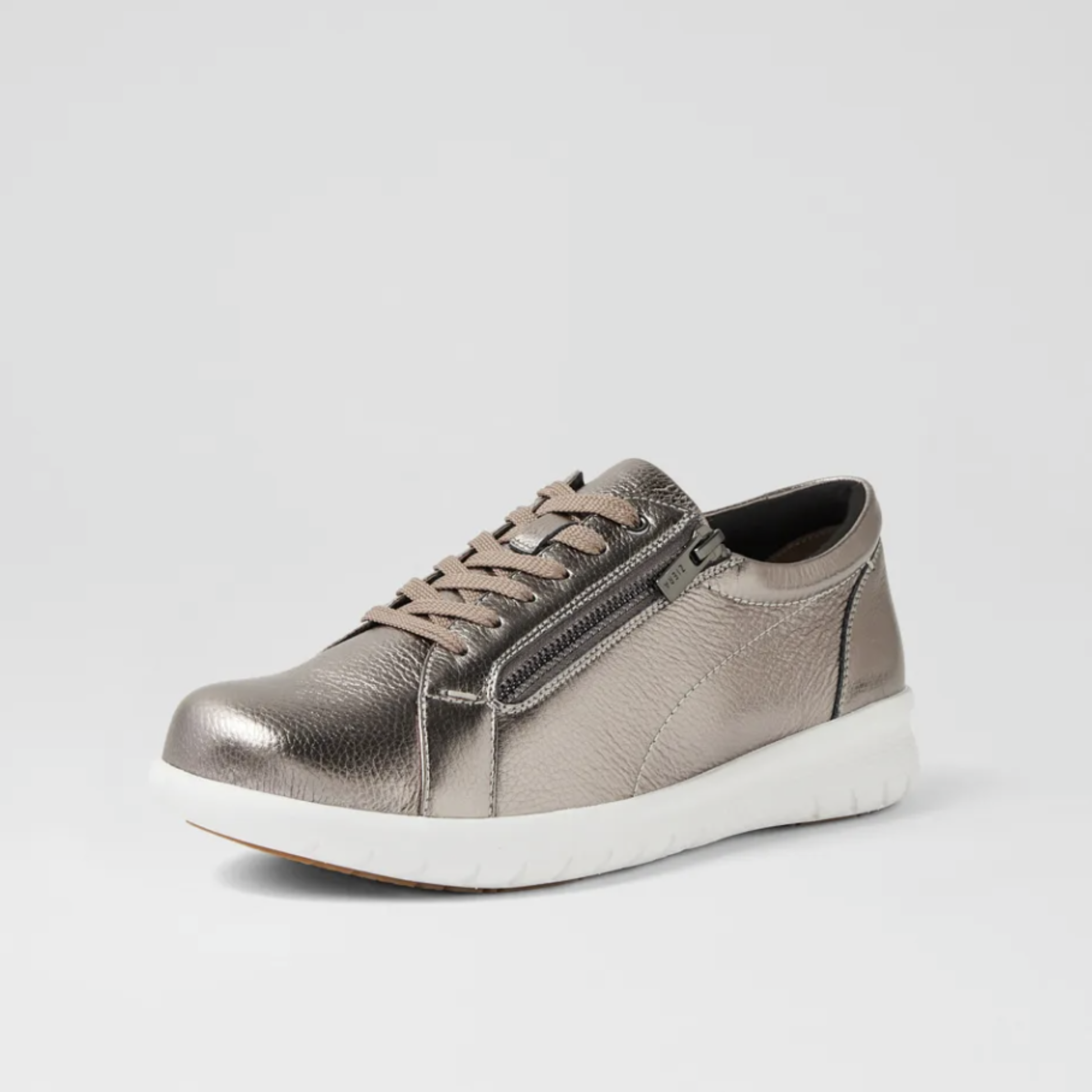 A metallic taupe leather low-top sneaker with a side zipper, matching laces, and a chunky white sole, shown against a light gray background.